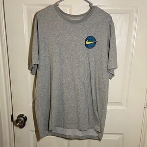 Nike Gray T-Shirt with Blue and Yellow Emblem